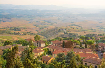 Fototapeta na wymiar Hillside settlement in Tuscany in Italy