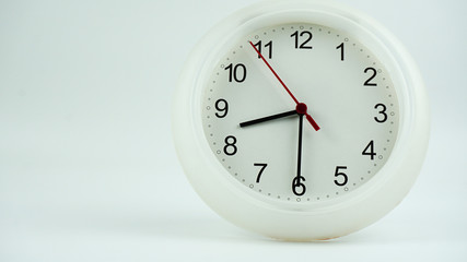 White wall clock on White background, Time concept..