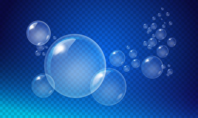 Transparent white bubbles of various sizes on a dark blue background.