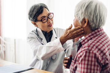 Doctor consulting and check up information with senior woman in hospital.elderly woman has sick.healthcare and medicine