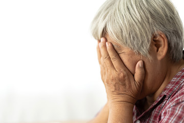 Fototapeta premium Senior adult elderly asia women serious depressed and feeling headache, thinking of problems on white background