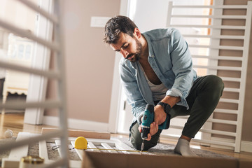 Preparing the crib for new family member