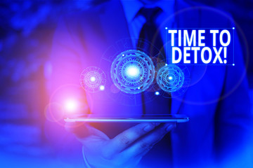 Conceptual hand writing showing Time To Detox. Concept meaning when you purify your body of toxins or stop consuming drug Male wear formal suit presenting presentation smart device