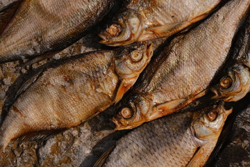 conceptual flat background of dried fish. vobla