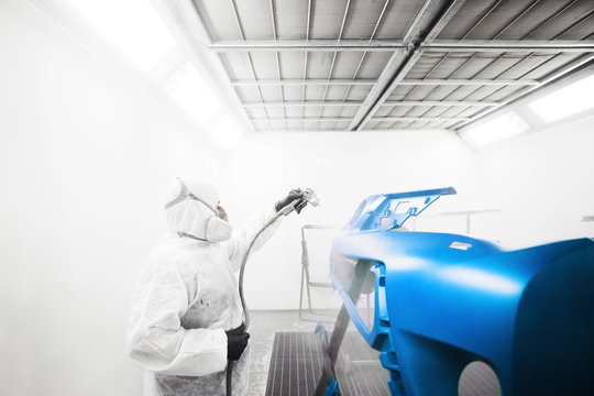 Coating of car body elements with paints and varnishes.