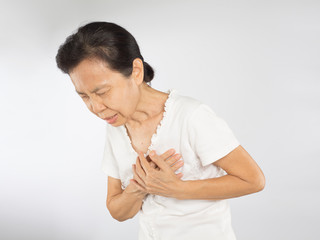 old asian woman feel chest pain around the heart because cardiology symptoms 