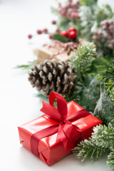 Christmas red gifts presents on isolated background. Festive holiday decorations on white background.