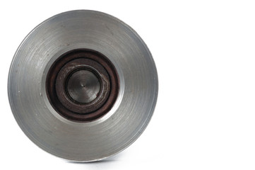 Small steel pulley isolated on white background.Copy space