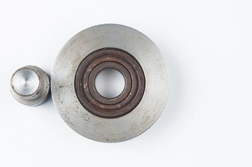Small steel pulley isolated on white background.Copy space
