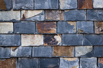 Close up on old worn and decaying roof tiles , material background texture