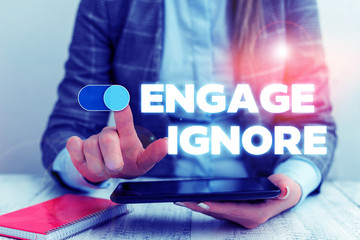 Conceptual hand writing showing Engage Ignore. Concept meaning Silent Treatment Manipulative...