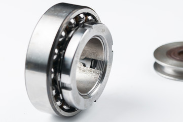 Ball bearing and pulley isolated on white background.Copy space