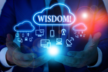 Word writing text Wisdom. Business photo showcasing quality having experience knowledge and good judgement something Male human wear formal work suit presenting presentation using smart device