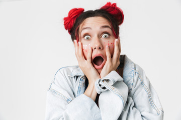 Image closeup of shocked young woman looking at camera