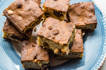 Blondie Brownie with Peanut Butter, White Chocolate and Roasted Peanuts. Homemade Cake Dessert / Blonde Brownie Pieces.