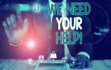 Handwriting text We Need Your Help. Conceptual photo asking someone to stand with you against difficulty Male human wear formal work suit presenting presentation using smart device