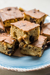 Blondie Brownie with Peanut Butter, White Chocolate and Roasted Peanuts. Homemade Cake Dessert / Blonde Brownie Pieces.