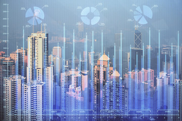 Forex graph on city view with skyscrapers background multi exposure. Financial analysis concept.