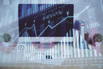 Forex graph hologram on table with computer background. Double exposure. Concept of financial markets.