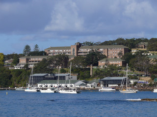 Fototapeta na wymiar Boats moored at Balmoral Beach in Sydney Harbour.