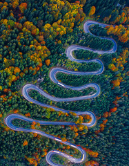 Scenic curvy road seen from a drone in autumn. Cheia, Romania.