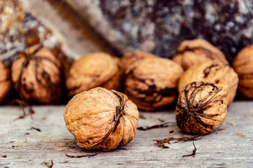 whole walnuts with shelving close-up.
