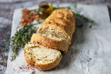 Fresh homemade italian bread with herbs and spices. Selective focus. Macro.