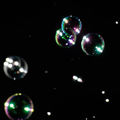 Blurred square background with soap bubbles
