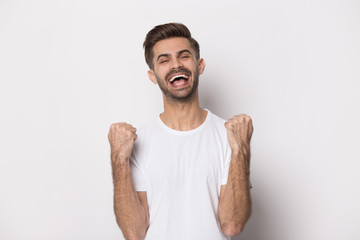 Overjoyed caucasian man feel euphoric with success