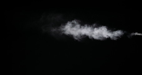 Real white smoke isolated on black background with visible droplets