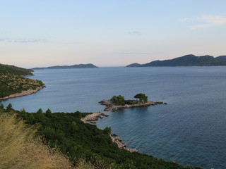 Coastal line with beach and islands - sea panorama