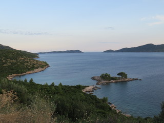 Fototapeta na wymiar Coastal line with beach and islands - sea panorama