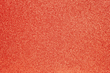 Red sparkling festive background, close-up. Copy space for text. Horizontal. Celebration, holidays, sales, fashion concept, harvesting for mock up