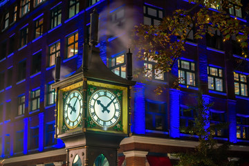 Fototapeta na wymiar Old Steam Clock in Vancouver's historic Gastown district at night
