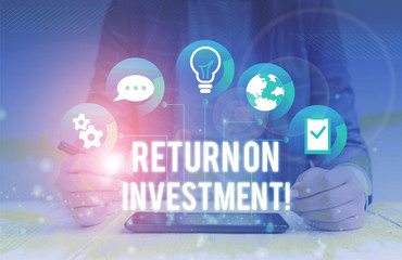 Conceptual hand writing showing Return On Investment. Concept meaning perforanalysisce measure used...