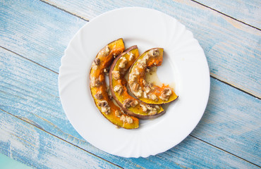 Baked pumpkin with honey and walnuts