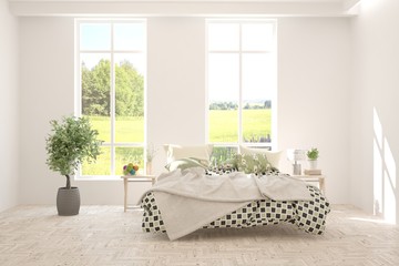 Stylish bedroom in white color with smmer landscape in window. Scandinavian interior design. 3D illustration