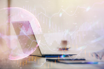 Multi exposure of graph and financial info and work space with computer background. Concept of...