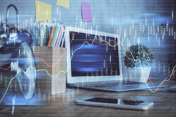 Multi exposure of forex chart and work space with computer. Concept of international online trading.