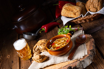 Spicy tripe soup with red paprika.