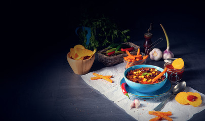 chili con carne with sweet potato and spicy nachos