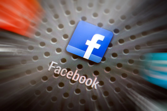 Social media icons on smart phone screen.