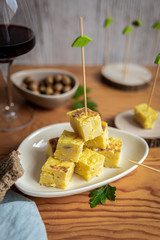 tapas, tortilla cut into squares