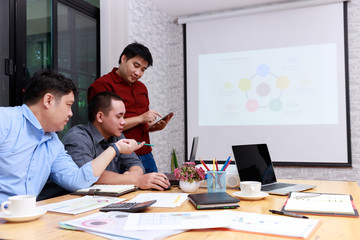 Small and Medium Enterprise Business concept of ,Businessmans discussing investment plan in office.