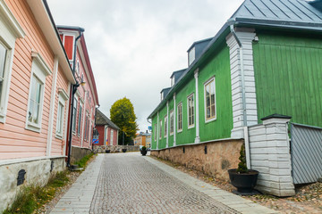 Street of Old Porvoo, Finland. Beautiful city autumn landscape with colorful wooden buildings.