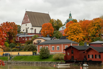 View of old Porvoo, Finland. Beautiful city autumn landscape with Porvoo Cathedral and colorful wooden buildings.