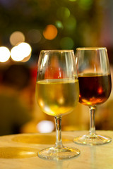Christmas sherry wine, dry or sweet jerez fortified wine in glasses and street lights, Jerez de la Frontera, Andalusia, Spain