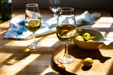 Sherry wine tasting, dry fino, manzanilla or palomino jerez fortified wine in glasses, Jerez de la Frontera, Andalusia, Spain