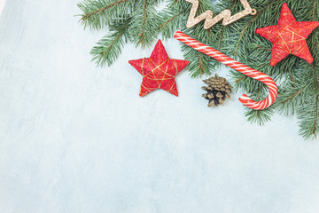 Fototapeta na wymiar Christmas border made of fir branches, festive red decoration