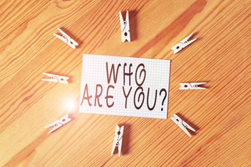 Conceptual hand writing showing Who Are You Question. Concept meaning asking about someone identity...